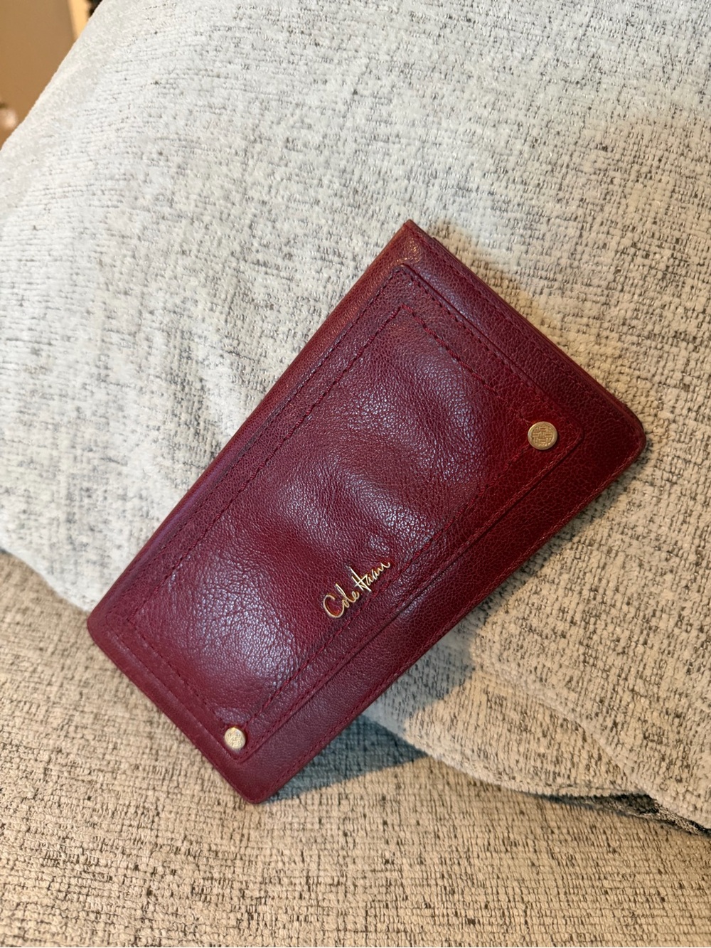 Cole Haan Wine Red Leather Envelope Wallet with Gold Accents